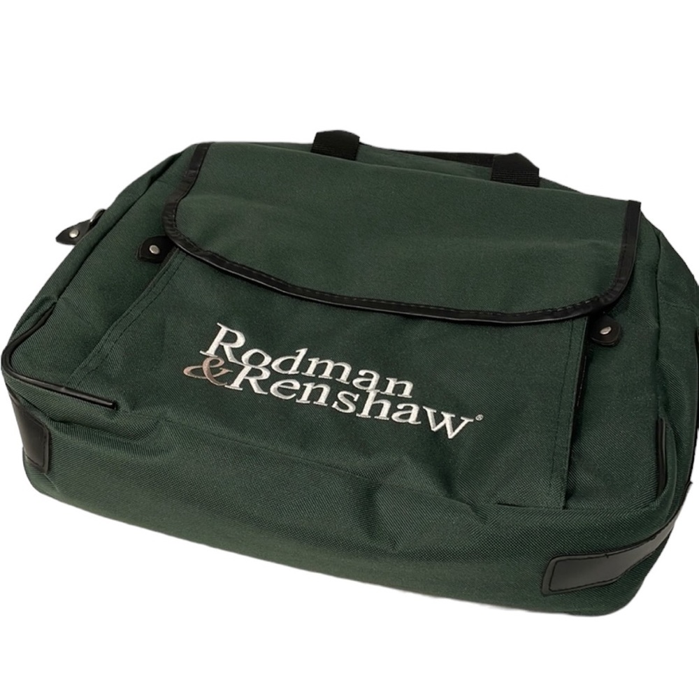 Dark green canvas briefcase with laptop sleeve and multiple pockets. NWT